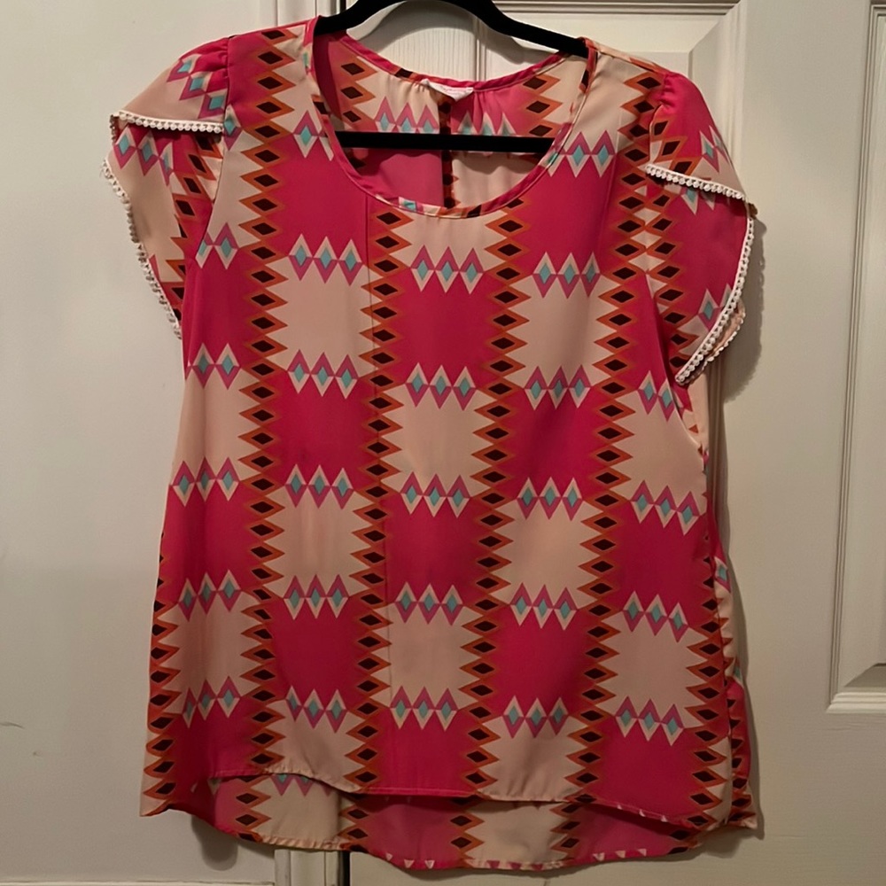 Women’s flowy pink boutique blouse